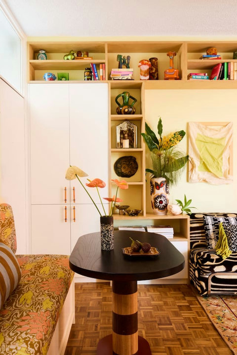 Vintage pieces, custom storage and collected treasures create a dining space with genuine character