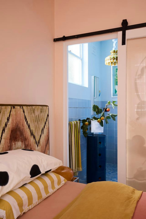 Wake up in a cosy queen bedroom filled with warm colour, thoughtful details and plenty of character