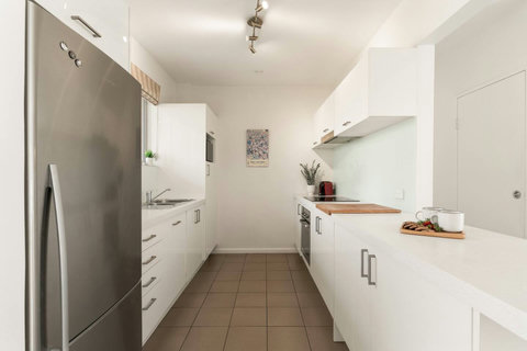 Kitchen | Prepare meals at home in the well-equipped kitchen with generous bench space and everyday essentials