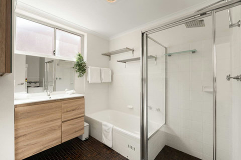 Bathroom | Freshen up in a bright bathroom with generous vanity space for your everyday essentials
