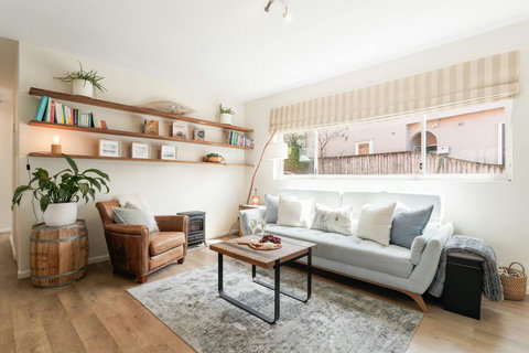 Settle into a bright and inviting lounge with comfortable seating and a relaxed coastal feel