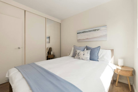 A cosy queen bedroom offering a quiet retreat when it is time to switch off