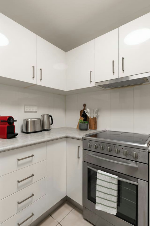 Cook at your own pace with a full-size oven, cooktop and everyday kitchen essentials