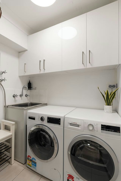 In-apartment washing machine and dryer make longer stays and light packing that much easier