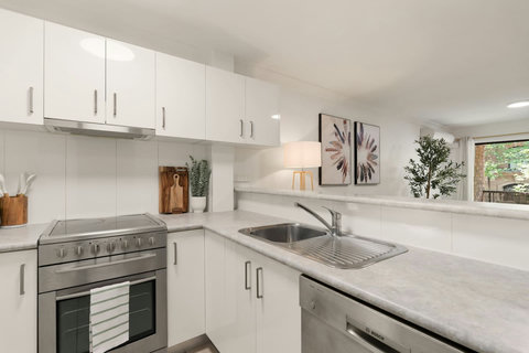A practical modern kitchen with generous bench space and everything you need for an easy stay
