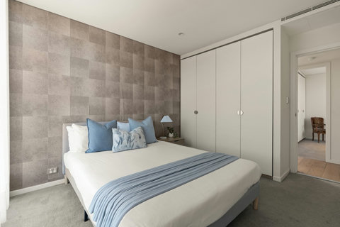 Bedroom 2 | Rest comfortably in a queen bed, with built-in storage for a convenient and relaxing stay.