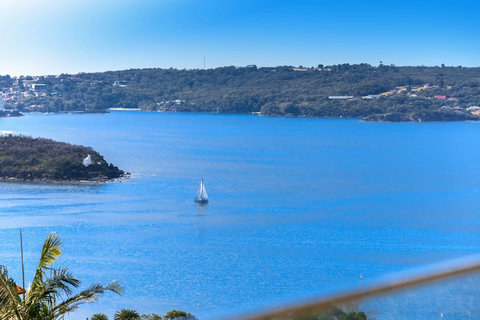 Elevated harbour views across the calm blue waters towards Mosman’s surrounding foreshore