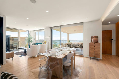 Living & Dining | A welcoming space to unwind, entertain or simply take in the stunning water views.
