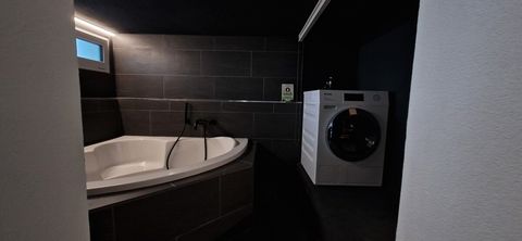 Badewanne und Waschmaschine