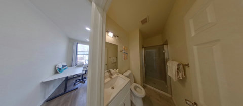 Master-suite with private bathroom, fresh towels and toiletries.