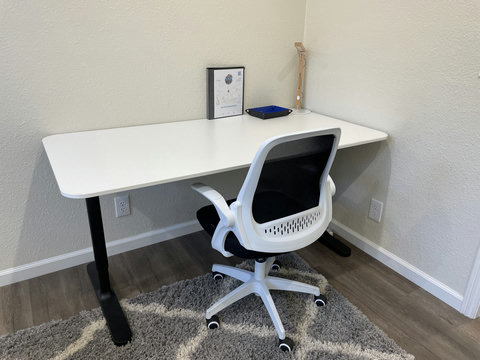 Desk with desk chair.