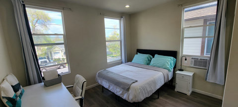 Queen sized bed, fresh linens, office work-station, black out curtains, window air-conditioner, master-suite with private bathroom.