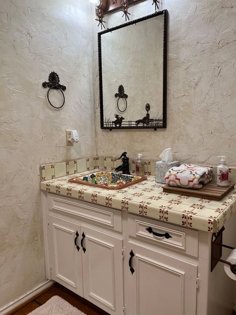 Half bathroom by the game room 