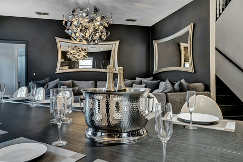 Indulge in Private Chef Dinners - Our Private Dining Room features elegant Philip Starck designed chairs, hosting up to 20 guests indoors. Sip cocktails and create unforgettable memories.