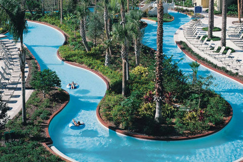 Orlando's only resort wave pool, lazy river, family pool, 125-foot corkscrew waterslide, adults-only pool. Daypass access from $15 Child or $40 Adult ($15 discount after 4 pm) (only about 5 miles away, based on availability & price subject to change)