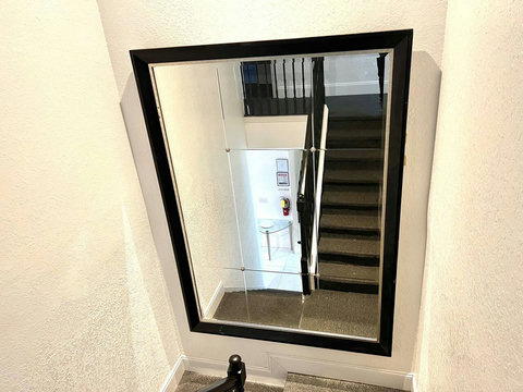 Reflect elegance on every step with our stunning staircase landing mirror. Elevate your home decor with this architectural masterpiece!
