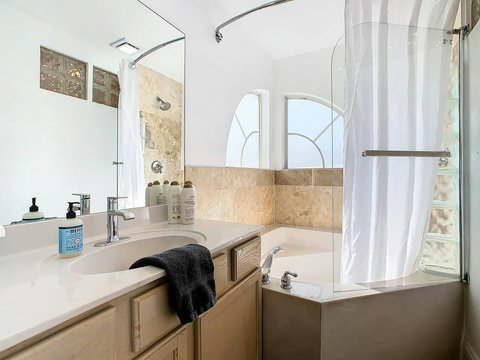 Your oasis of relaxation! Indulge in the luxury of a Jacuzzi tub and shower combo, creating a spa-like haven for your ultimate comfort.

