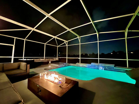 Outdoor Dining - Host exclusive private chef dinners for up to 24 guests outside and 20 inside, complemented by Philip Starck designed chairs. Enjoy scenic views of the private pool, golf course, and unwind by the Fire Pit with a cocktail.
