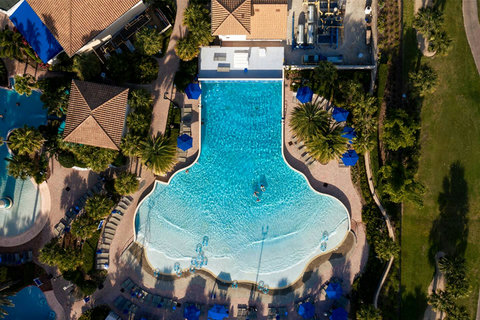 Orlando's only resort wave pool, lazy river, family pool, 125-foot corkscrew waterslide, adults-only pool. Daypass access from $15 Child or $40 Adult ($15 discount after 4 pm) (only about 5 miles away, based on availability & price subject to change)