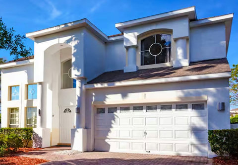 Welcome to DisneyMansion! Enjoy stunning exterior design with beautiful views over your private pool, championship golf course, and resort clubhouse. Access amenities like Lap Pool, Pickleball, Tennis, and Children's Playground.
