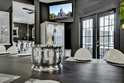 Indulge in Private Chef Dinners - Our Private Dining Room features elegant Philip Starck designed chairs, hosting up to 20 guests indoors. Sip cocktails and create unforgettable memories.
