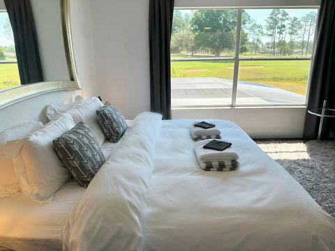 Enjoy stunning golf course view and choose between 1 King Bed or 2 Twin Beds for a comfortable stay!
