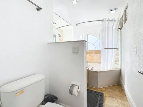Your oasis of relaxation! Indulge in the luxury of a Jacuzzi tub and shower combo, creating a spa-like haven for your ultimate comfort.
