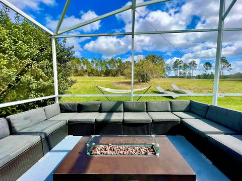 Outdoor Dining - Host exclusive private chef dinners for up to 24 guests outside and 20 inside, complemented by Philip Starck designed chairs. Enjoy scenic views of the private pool, golf course, and unwind by the Fire Pit with a cocktail.