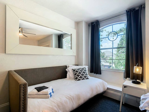 Choose between 1 King Bed or 2 Twin Beds and relax on the cozy daybed for a restful stay.
