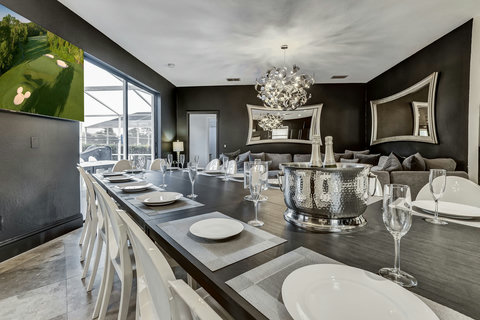 Indulge in Private Chef Dinners - Our Private Dining Room features elegant Philip Starck designed chairs, hosting up to 20 guests indoors. Sip cocktails and create unforgettable memories.