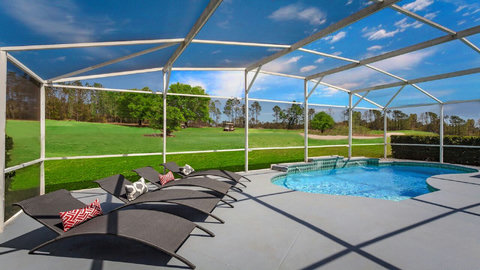 Private Pool overlooking golf course with sunbeds