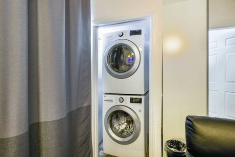 Convenient Laundry Access - Enjoy the ease of having a washer and dryer at your disposal.