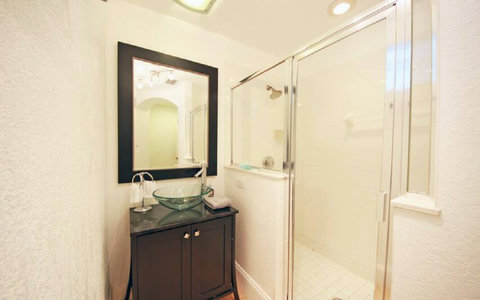 Relaxing Bathroom with Shower and Bathtub Combo - Enjoy a soothing bath or refreshing shower in our well-designed bathroom.