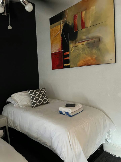 Choose between 1 King Bed or 2 Twin Beds and relax on the cozy daybed for a restful stay