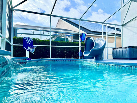 Exclusive Outdoor Oasis - Relax in our private pool with enchanting waterfalls and eclectic lighting. Play basketball with our pool basketball hoop, or slide down the water slide. Unwind in the hot tub and enjoy a fine glass of wine by the Fire Pit.