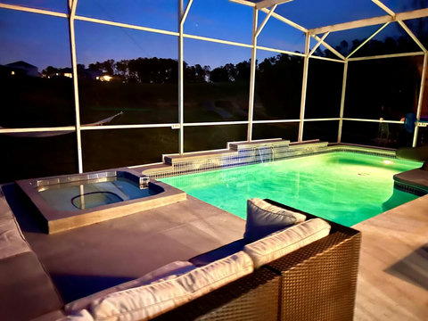 Outdoor Dining - Host exclusive private chef dinners for up to 24 guests outside and 20 inside, complemented by Philip Starck designed chairs. Enjoy scenic views of the private pool, golf course, and unwind by the Fire Pit with a cocktail.
