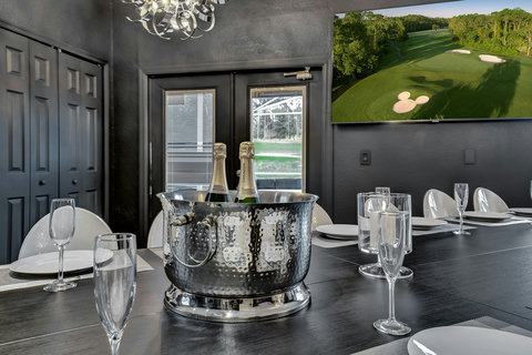 Indulge in Private Chef Dinners - Our Private Dining Room features elegant Philip Starck designed chairs, hosting up to 20 guests indoors. Sip cocktails and create unforgettable memories.