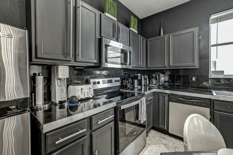 Enjoy modern kitchen fully equipped with state-of-the-art appliances for your culinary adventures.