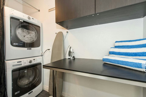 Convenient Laundry Access - Enjoy the ease of having a washer and dryer at your disposal.