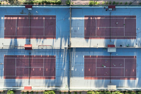 Tennis at Your Fingertips: Enjoy complimentary tennis less than 50 yards from your doorstep (based on availability when the tennis academy is not using courts).