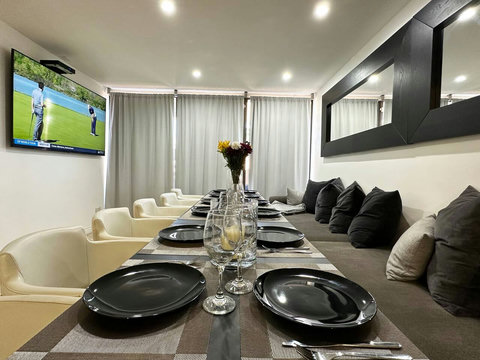 Welcome to Entertaining Modern Living! Gather in this spacious Dining & Bar Lounge with a long table for larger groups. Enjoy the 70-inch 4K Smart TV and step outside to the outdoor SPA patio. Perfect for memorable moments with family & friends!
