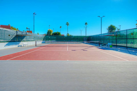 Tennis at Your Fingertips: Enjoy complimentary tennis less than 50 yards from your doorstep (based on availability). 