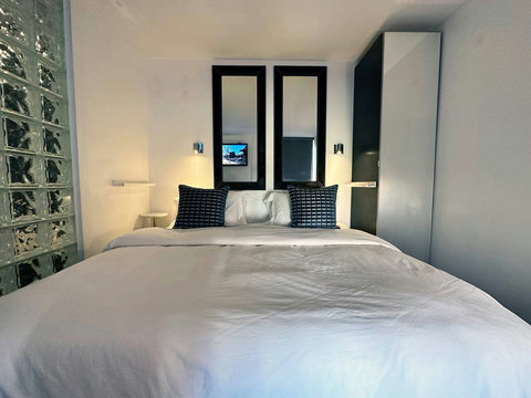 En-Suite Bedroom with 1 King or 2 Twin Beds and closet. All Bedrooms come with comfortable down comforters and down pillows. 