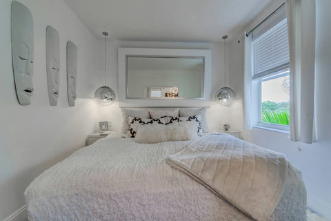 Experience our elegant bedroom, where you can choose between 1 King or 2 Twin beds for your perfect slumber.
