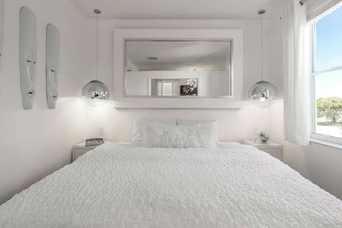 Experience our elegant bedroom, where you can choose between 1 King or 2 Twin beds for your perfect slumber.