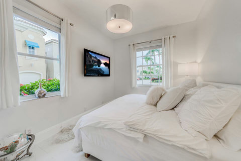 A bedroom retreat with entertainment! Experience our elegant home, where a Smart TV ensures you can unwind with your preferred programs.