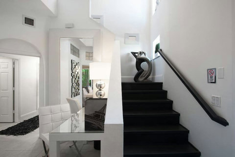 Contemporary elegance! Experience our home's modern design features, an architectural delight that elevates your stay.