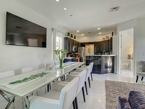 Time to dine in style! Our chic home offers an inviting dining area, perfect for savoring meals and creating lasting memories.