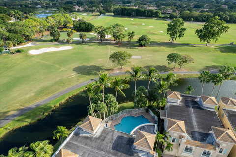 Captivating Aerial View of PGA National - Behold the stunning beauty of our resort from a bird's-eye perspective. A truly unforgettable experience!