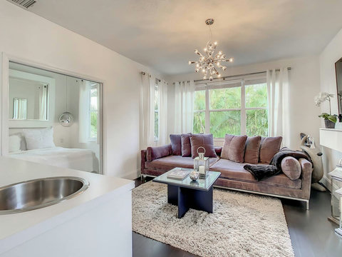 Welcome to comfort! Our chic home's living room offers a cozy retreat to relax and unwind with loved ones.